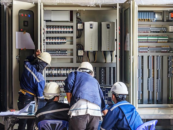 engineer-working-checking-maintenance-equipment-wiring-plc-cabinet