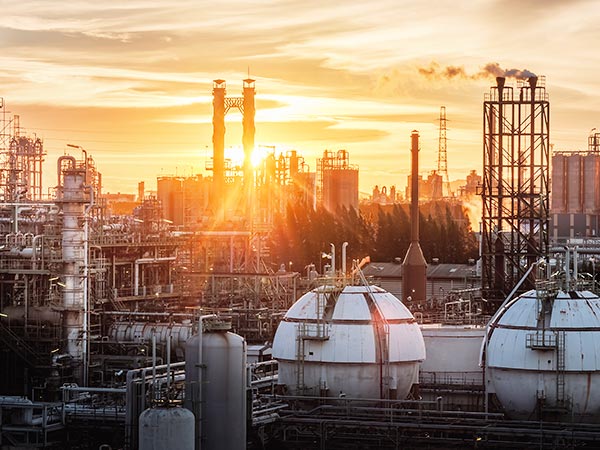 gas-storage-sphere-tanks-petrochemical-industry-oil-gas-refinery-plant-evening-manufacturing-petroleum-industrial-plant-with-gas-column-smoke-stacks-sunset-sky