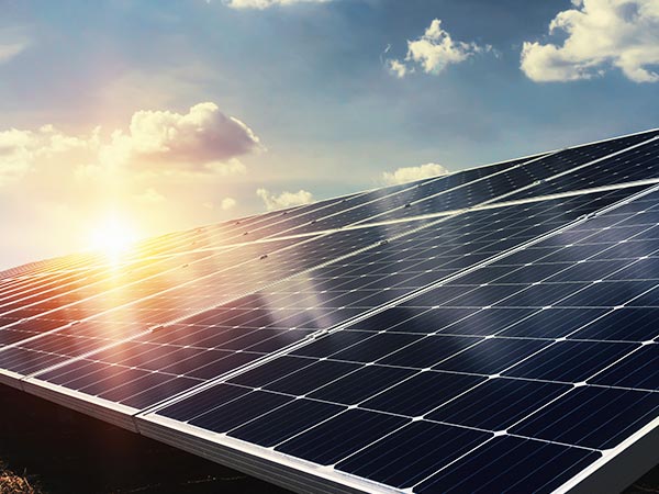 solar-panel-with-sunlight-blue-sky-background-concept-clean-energy-power-nature